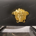 Elegant TV Stand with Upholstered Texture and Gold Metal Base